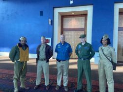 Dave Shultz with Living History volunteers in uniform.