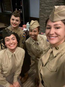 Selfie of four living history volunteers during the Women in the Air Force Association luncheon.