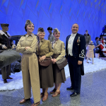 Maj. Justin Lewis, Commander and Conductor of the Band of the West poses with a few of our reenactors